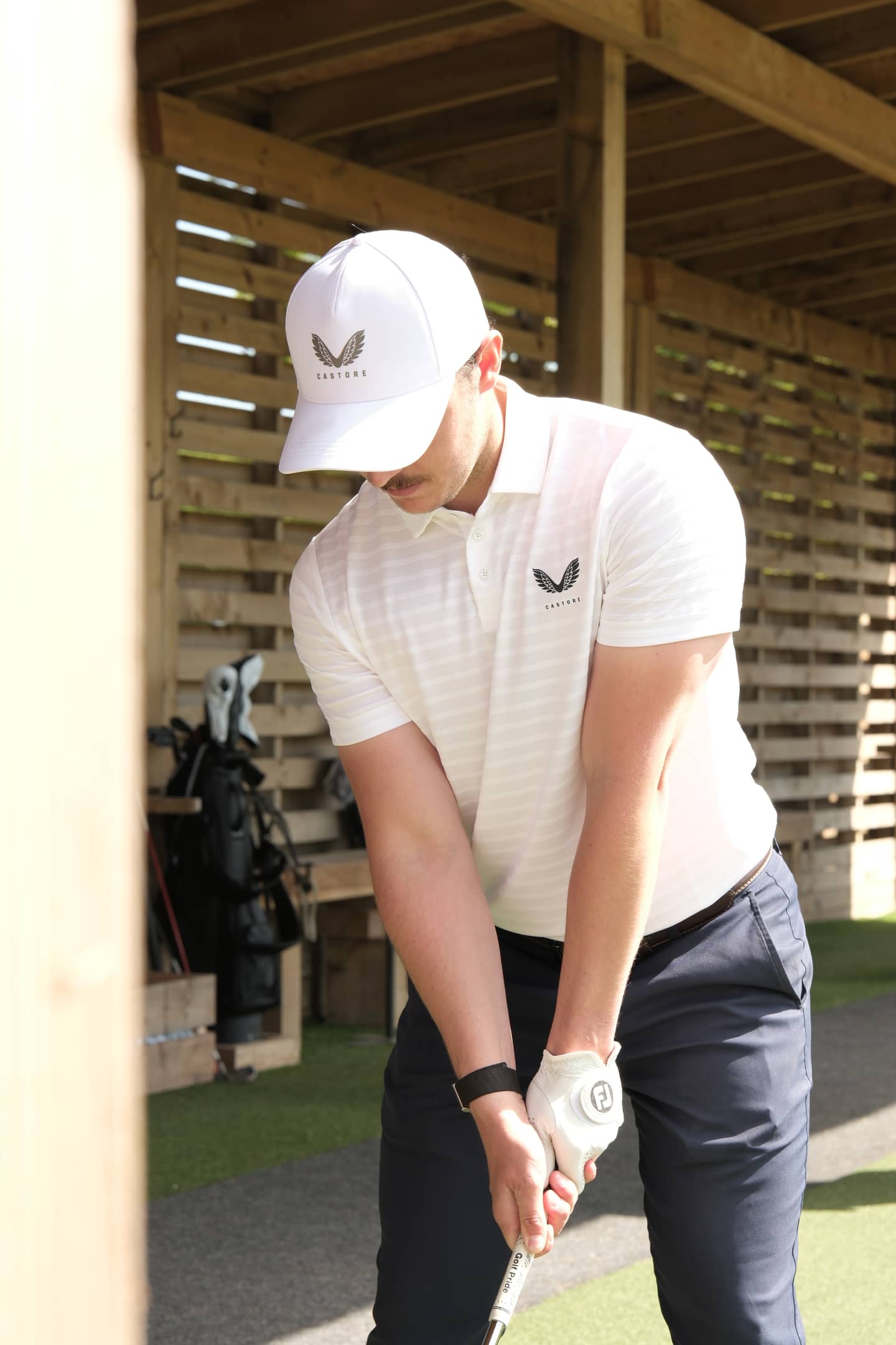 Huw Williams in the covered coaching bay at address